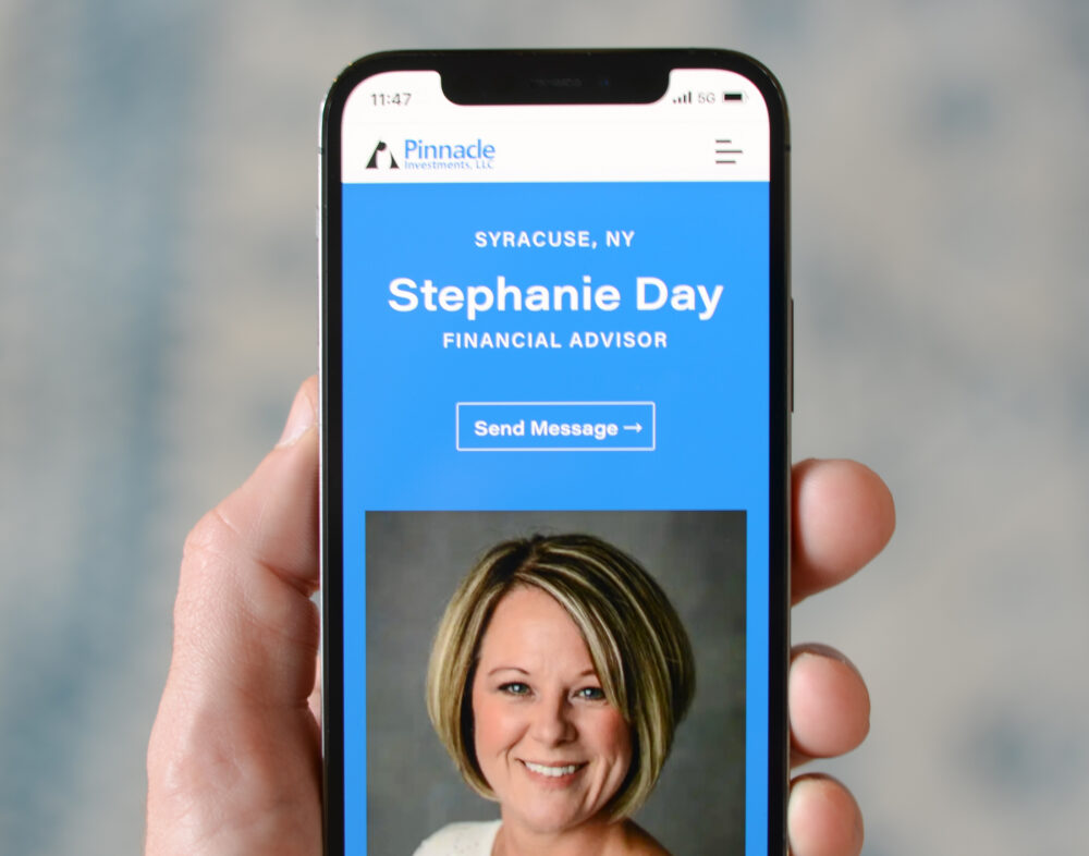 Pinnacle Investments responsive team advisor page for Stephanie Day shown on an iPhone 12 being held by a person