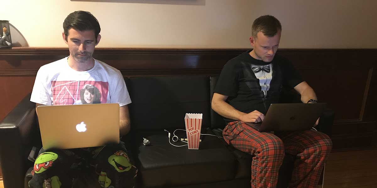 Andy and Colin working in pajamas